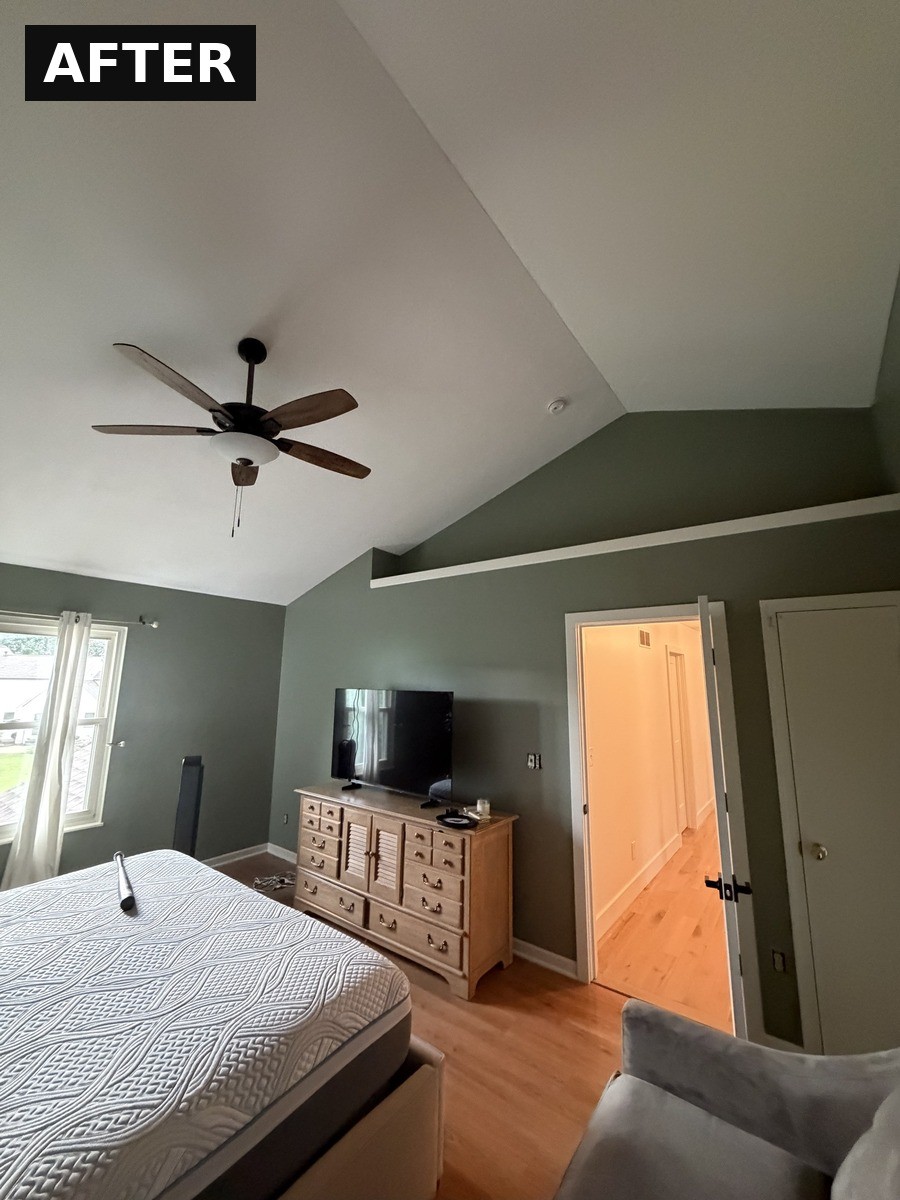 Bedroom painted sage green with white vaulted ceiling in Westerville, OH